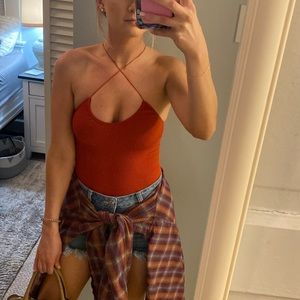 Urban Outfitters seamless ribbed bodysuit in Rust